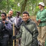 Should I hire a porter while on gorilla trekking?